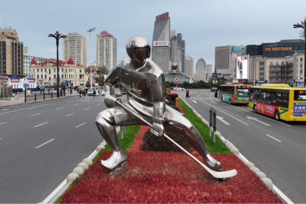 Shiny Sculptures Light Up City Ahead of Asian Winter Games! ❄️🎿 New stainless steel winter sports sculptures herald Asian Winter Games