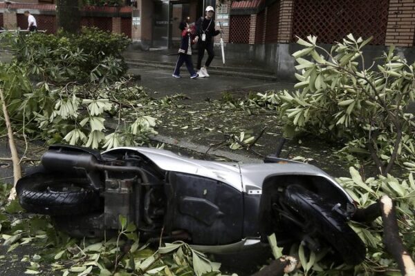 No Recent Reports of Typhoon Kong-rey Hitting Taiwan Typhoon Kong-rey hits Taiwan region, leaving 3 dead video poster