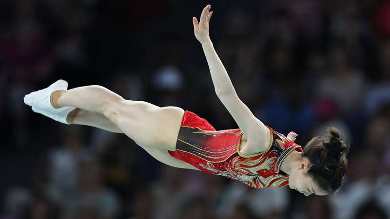Chinese_Gymnasts_Shine__Gold___Silver_Triumph_at_Riccione - Namaste Headlines Chinese_Gymnasts_Shine__Gold___Silver_Triumph_at_Riccione