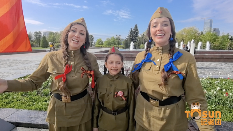 Three_Gen_Family_Honors_WWII_with__Katyusha__in_Moscow_poster - Namaste Headlines Three_Gen_Family_Honors_WWII_with__Katyusha__in_Moscow video poster