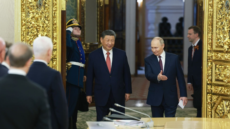 Xi_and_Putin_Strengthen_Global_Trade_Ties_in_Moscow
