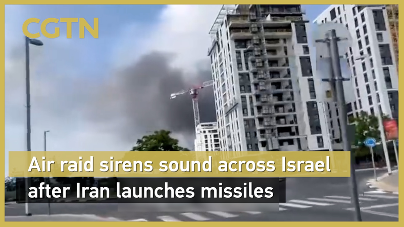 Air_Raid_Sirens_Sound_in_Israel_as_Iran_Launches_Missiles_poster - Namaste Headlines Air_Raid_Sirens_Sound_in_Israel_as_Iran_Launches_Missiles video poster