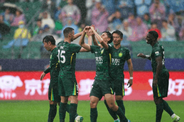 Guoan Edges Ahead: Thrilling 2-1 Win Rocks CSL Guoan_Edges_Ahead__Thrilling_2_1_Win_Rocks_CSL