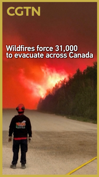 Wildfires_Spark_Massive_31K_Evacuations_in_Canada_poster - Namaste Headlines Wildfires_Spark_Massive_31K_Evacuations_in_Canada video poster