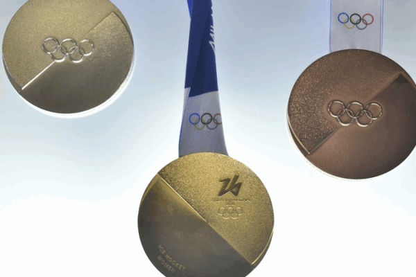 2026 Winter Olympics Medals Spark Unity in Bold Design 2026_Winter_Olympics_Medals_Spark_Unity_in_Bold_Design