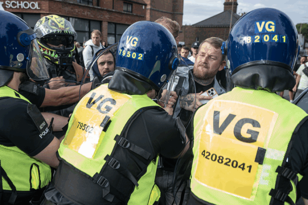London Clashes: Migrant Hotel Protest Escalates London_Clashes__Migrant_Hotel_Protest_Escalates