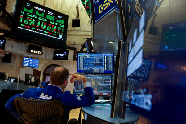 US_Stocks_Mixed_as_Fed_Holds_Rates__Tech_Shines