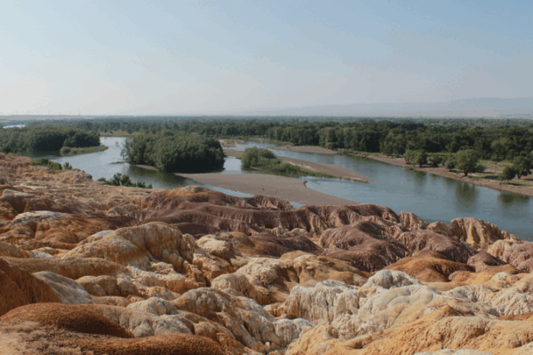 Explore Wucaitan: Rainbow Sands of Xinjiang Shaped by Fire & Time Explore_Wucaitan__Rainbow_Sands_of_Xinjiang_Shaped_by_Fire___Time