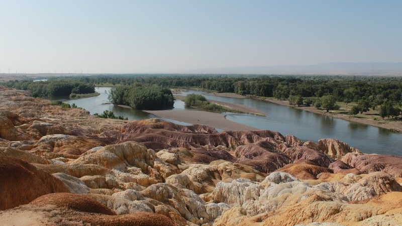 Explore_Wucaitan__Rainbow_Sands_of_Xinjiang_Shaped_by_Fire___Time