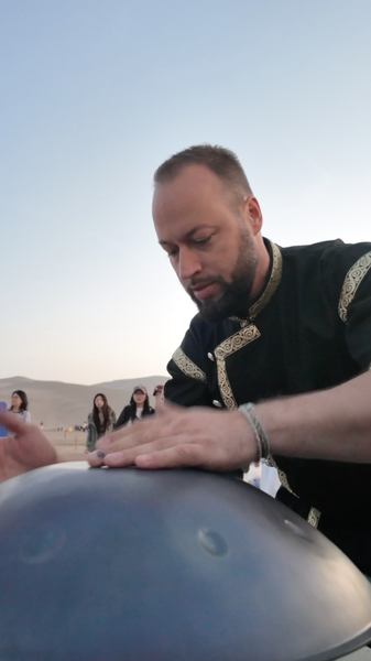 Hungarian_Handpan_Artist_Wows_with_Dunhuang_Flash_Mob_poster - Namaste Headlines Hungarian_Handpan_Artist_Wows_with_Dunhuang_Flash_Mob video poster