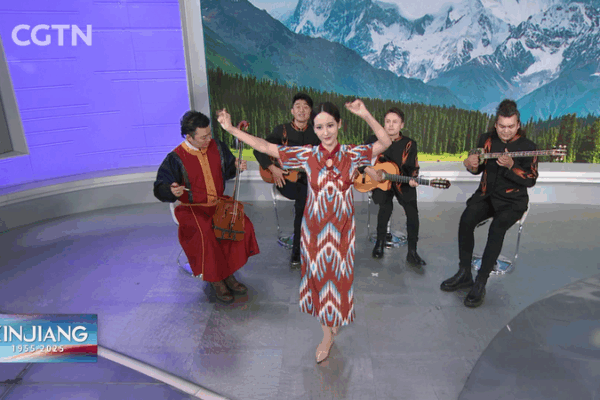 Oghuz’s “A Glass of Wine” Shines at CGTN’s 70th Xinjiang Celebration Oghuz’s “A Glass of Wine” Shines at CGTN’s 70th Xinjiang Celebration video poster