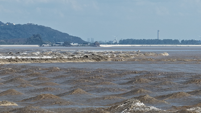 Ride the Wave: 2025 Qiantang River Tidal Bore Spectacle 🌊 video poster