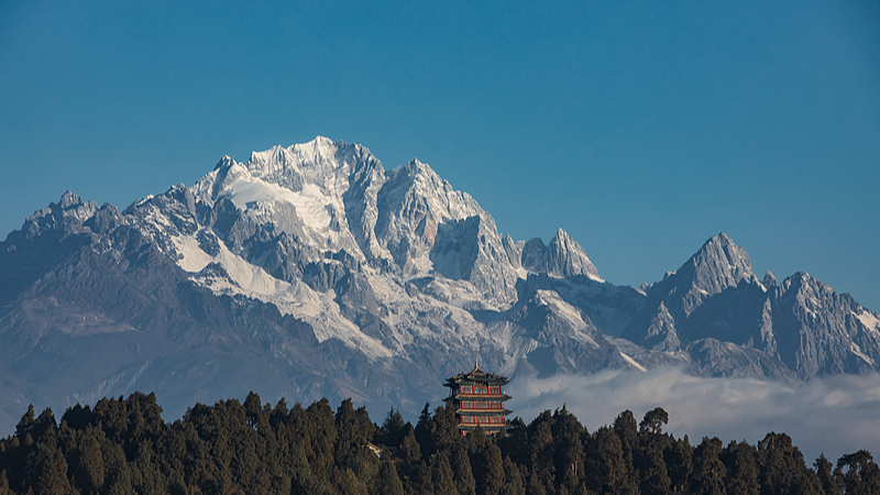 Discover Yulong Snow Mountain: Yunnan’s Black & White Wonder video poster