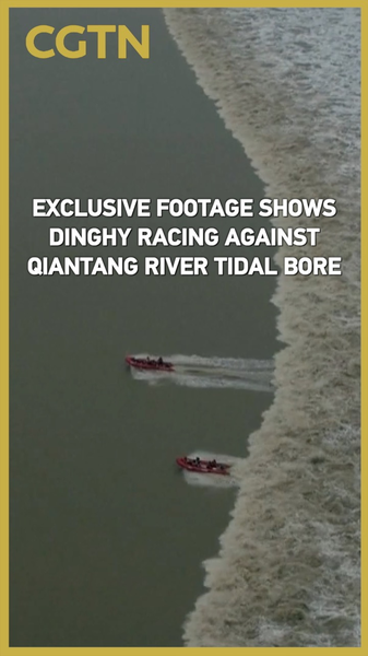 Dinghy_vs_Tidal_Wave__CMG_s_Qiantang_River_Pursuit_Boat_Exclusive video poster