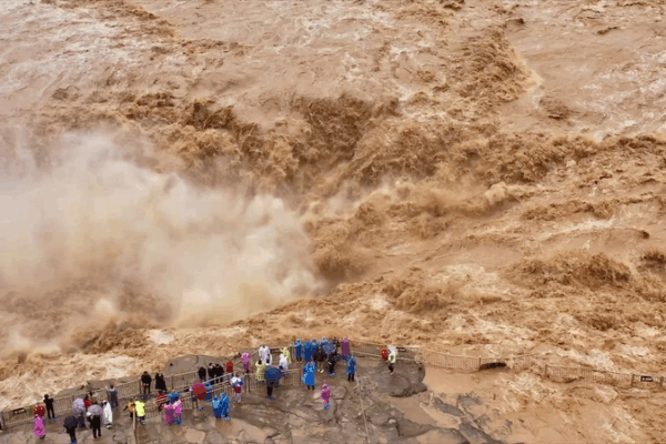 Hukou Waterfall Roars into Golden Cascade at 2,000 m³/s Hukou Waterfall Roars into Golden Cascade at 2,000 m³/s video poster