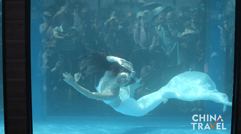 Mermaids_Dazzle_at_Hainan_Auto_Eco_Camping_Expo - Namaste Headlines Mermaids_Dazzle_at_Hainan_Auto_Eco_Camping_Expo