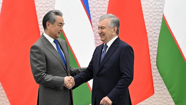 Uzbek_President_Meets_China_s_FM_Wang_Yi_to_Boost_Tech___Rail_Links - Namaste Headlines Uzbek_President_Meets_China_s_FM_Wang_Yi_to_Boost_Tech___Rail_Links