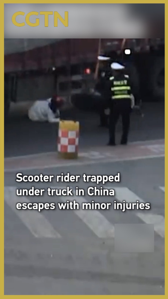 Scooter Rider Miraculously Survives Under-Turn Truck in Anhui 🚨🛵 video poster