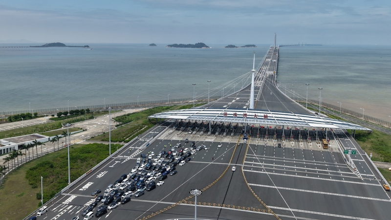 Hong Kong-Zhuhai-Macao Bridge Hits 100M Trips & Revolutionizes Travel 🚗🌉