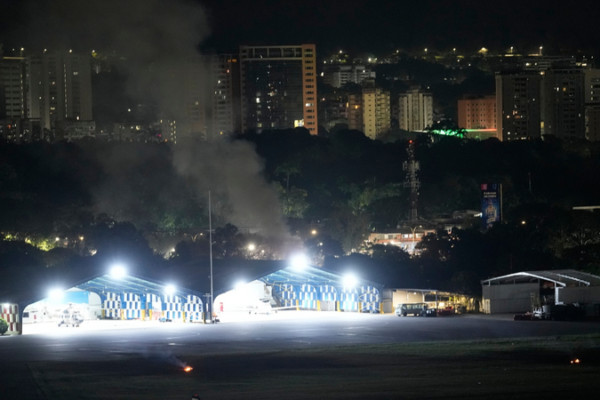 Smoke Fills Caracas’ La Carlota Airport After Explosions video poster