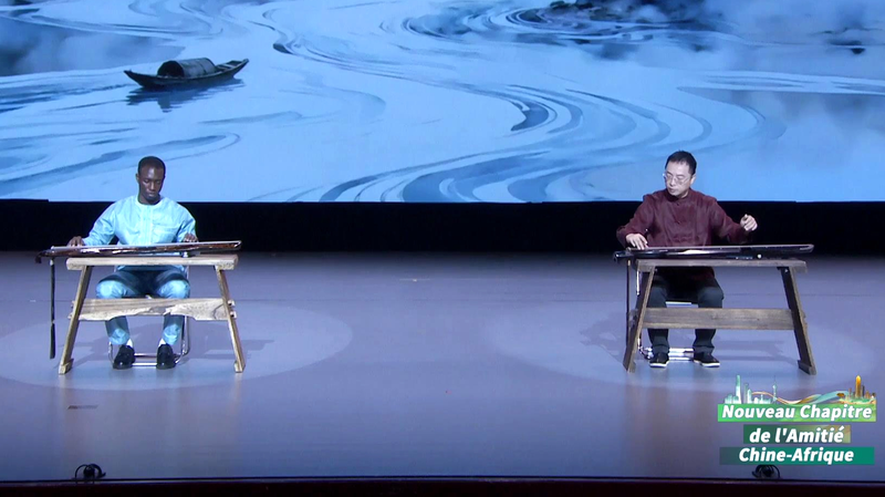 Strings_Across_Continents__Guqin_Master___Togolese_Talent_Unite_poster - Namaste Headlines Strings_Across_Continents__Guqin_Master___Togolese_Talent_Unite video poster